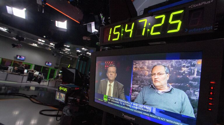 Путин отметил профессионализм журналистов RT