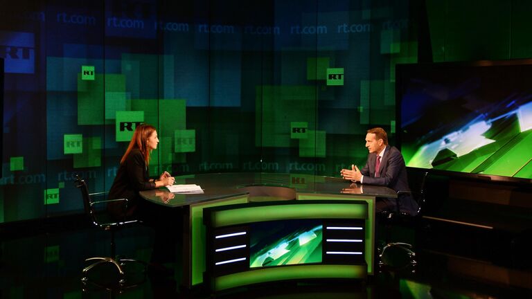 Путин отметил профессионализм журналистов RT